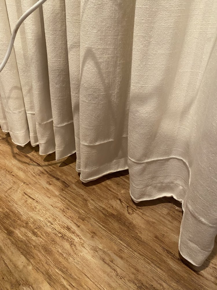 Cleaned drapes hanging
