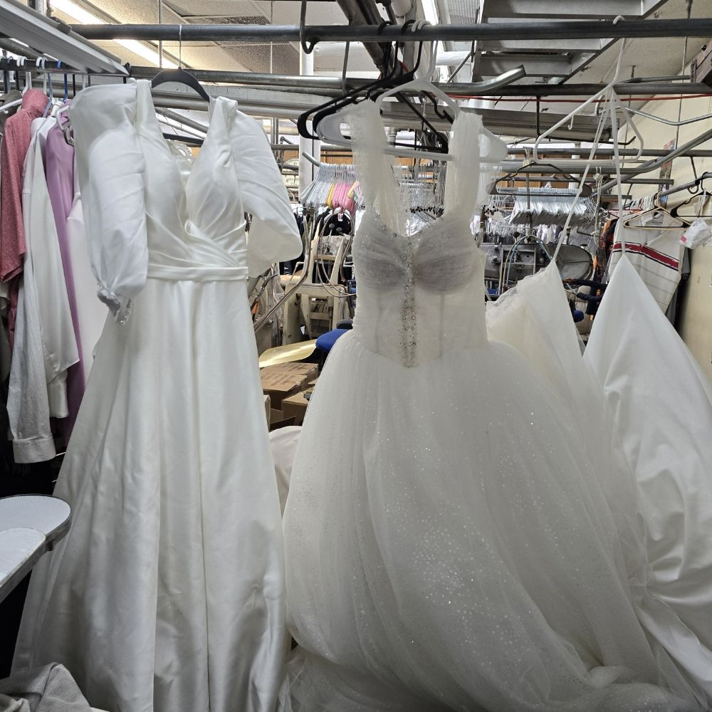 Wedding gowns cleaned and hanging in the plant
